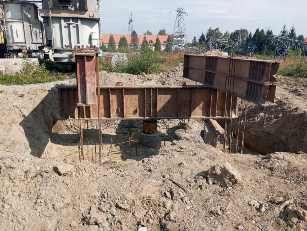 Статичне випробування ґрунтів палями вдавлювальним навантаженням